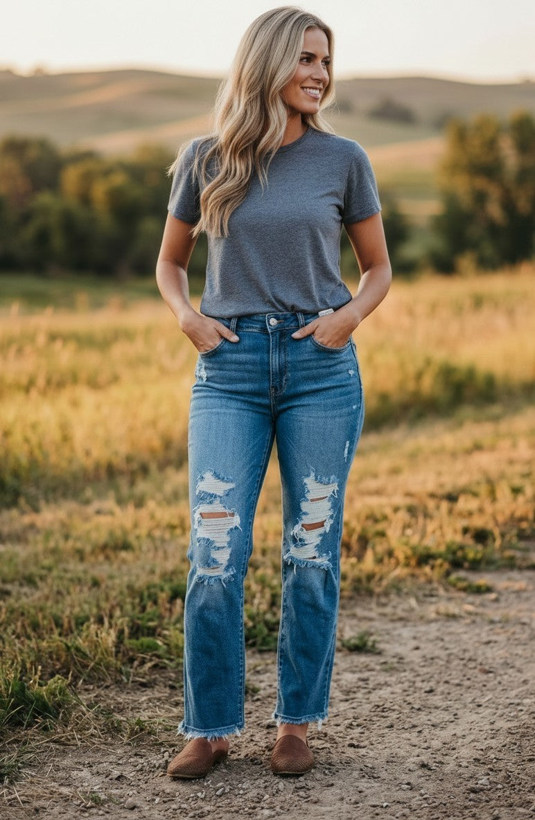 Woman wearing Judy Blue Mr. Dad jeans from Wildflowers Clothing Boutique