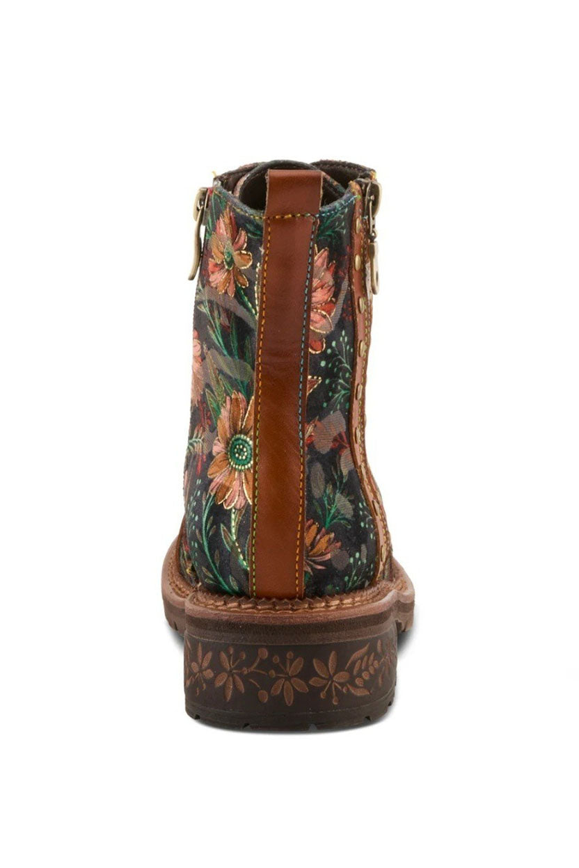 Floral-patterned boot with brown accents on a white background