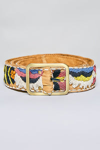 Colorful embroidered belt with a gold buckle on a light gray background