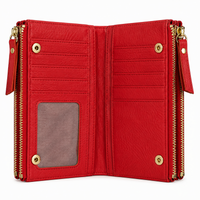 An open red leather wallet with gold-tone hardware, featuring multiple card slots, a clear ID window, and a zip-around closure on a white background.