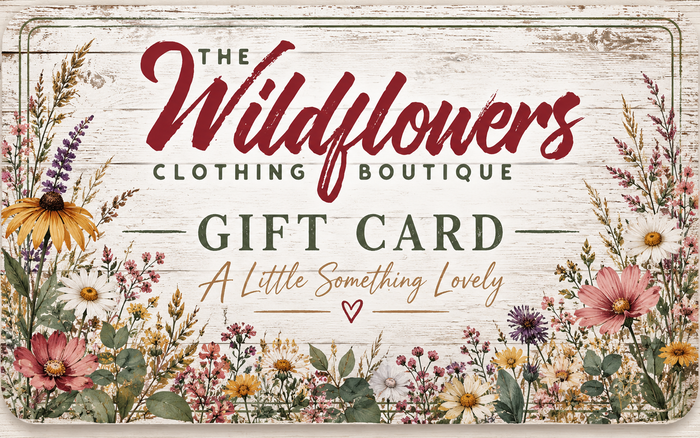 Wildflowers Clothing Boutique digital gift card featuring a rustic wood background, colorful boho wildflowers, and the words A Little Something Lovely.